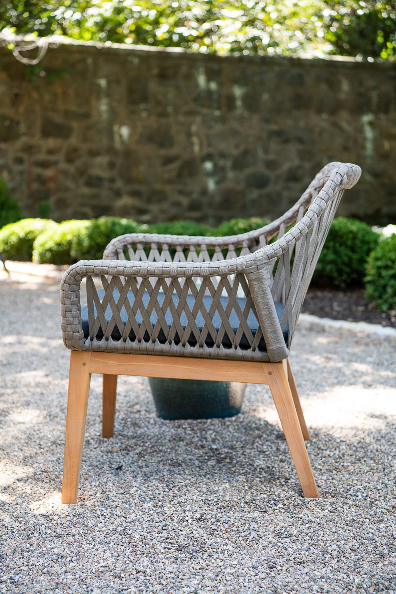 Wicker chair in a garden setting