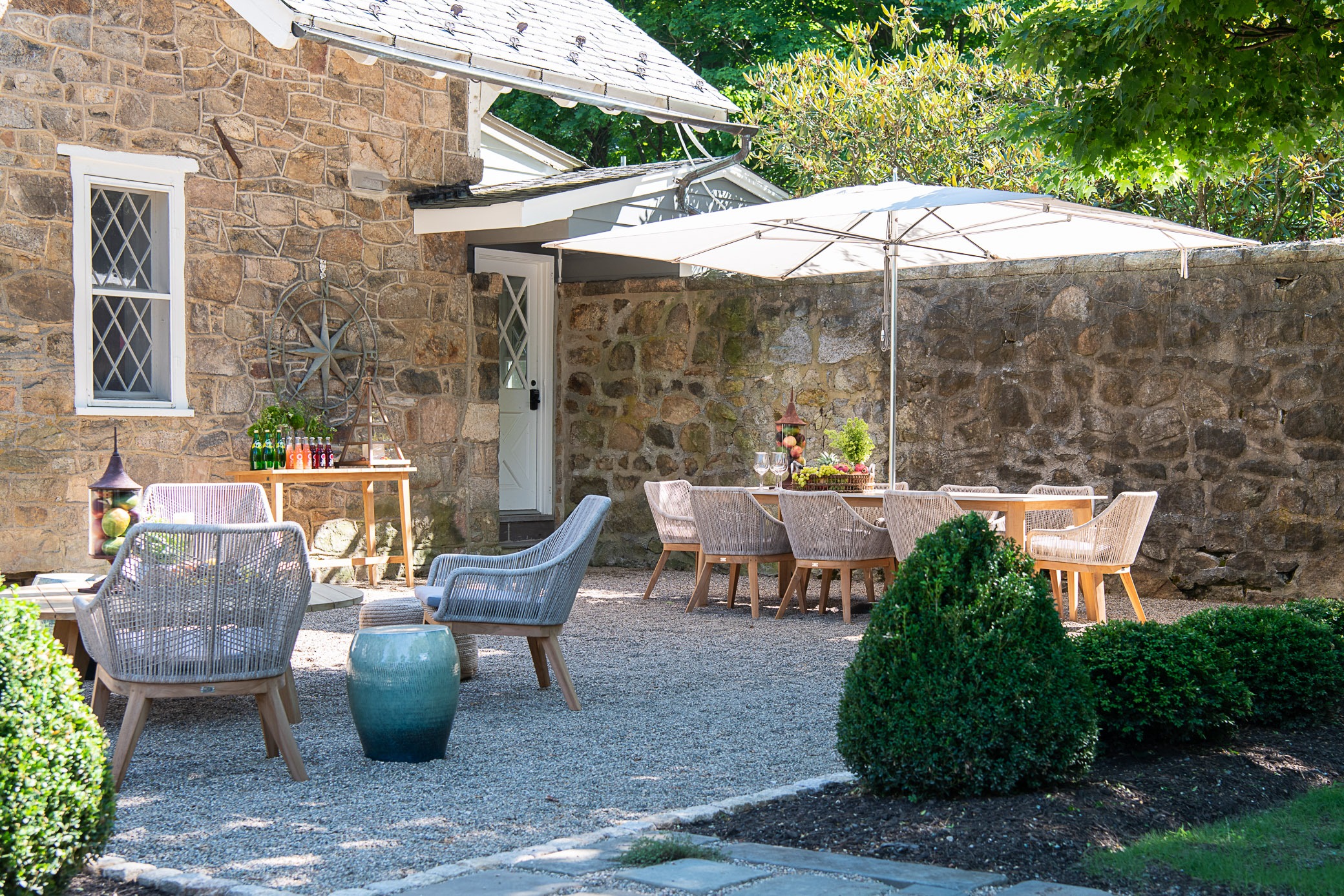 Charming stone patio with outdoor dining area