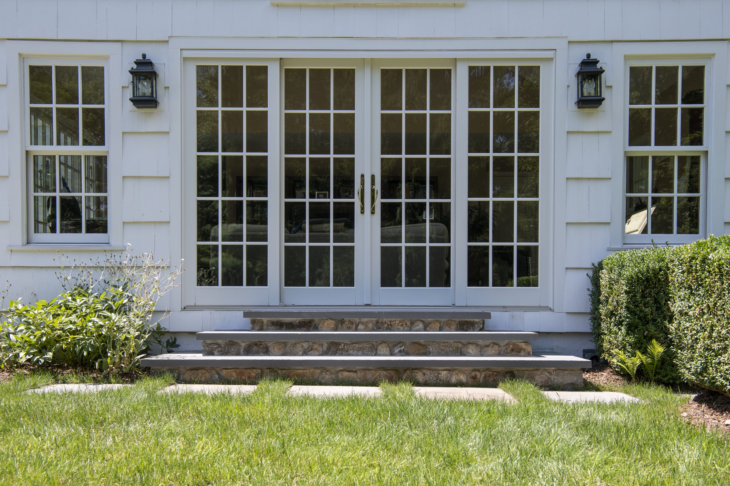 French doors with surrounding windows