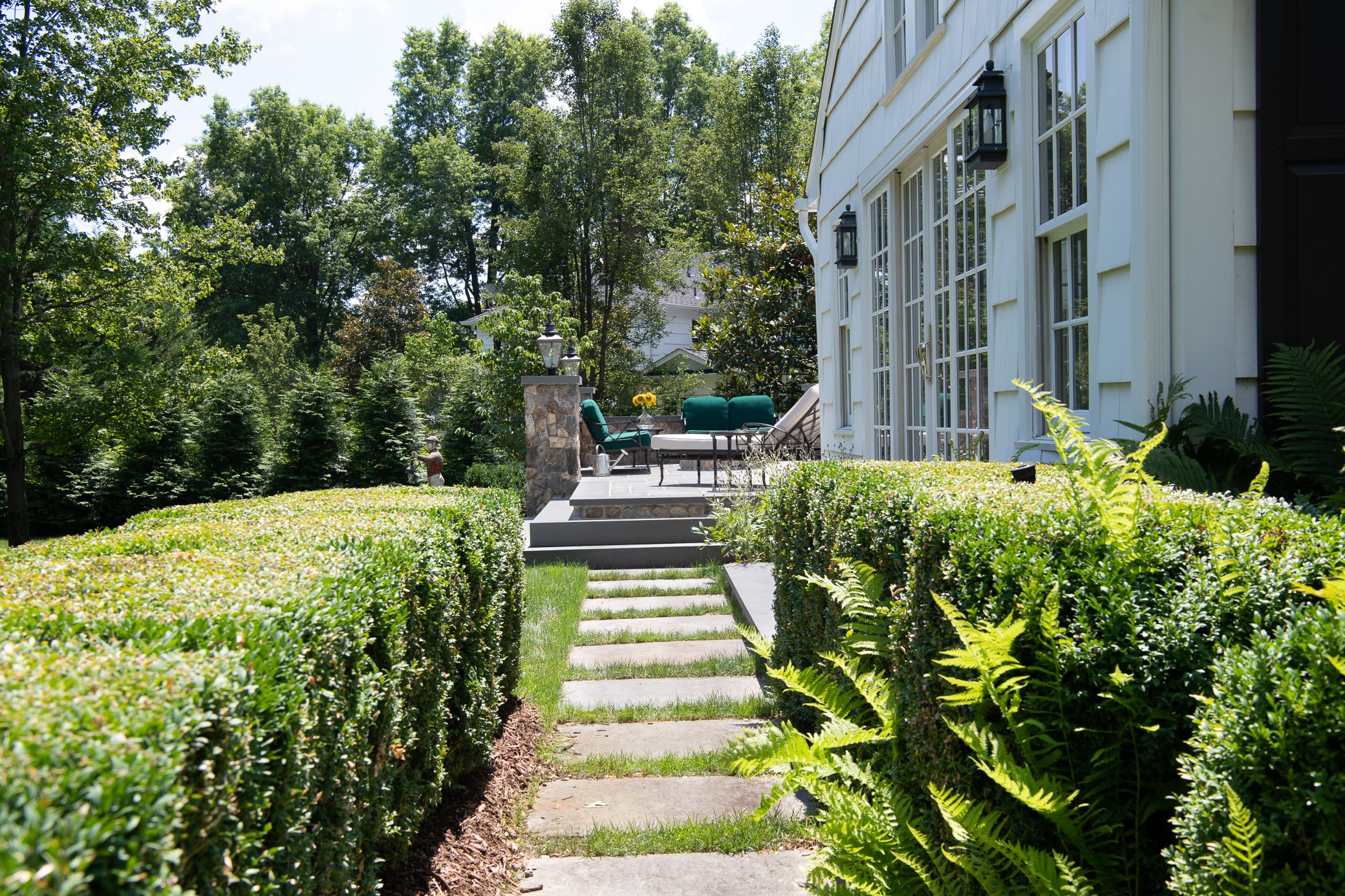 Garden pathway leading to patio