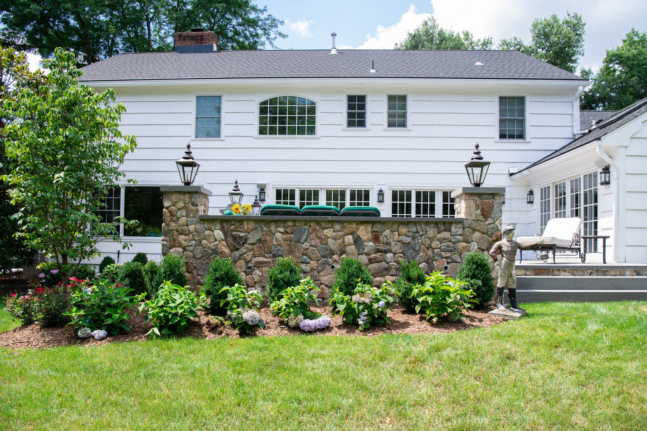 Charming backyard with stone patio and garden