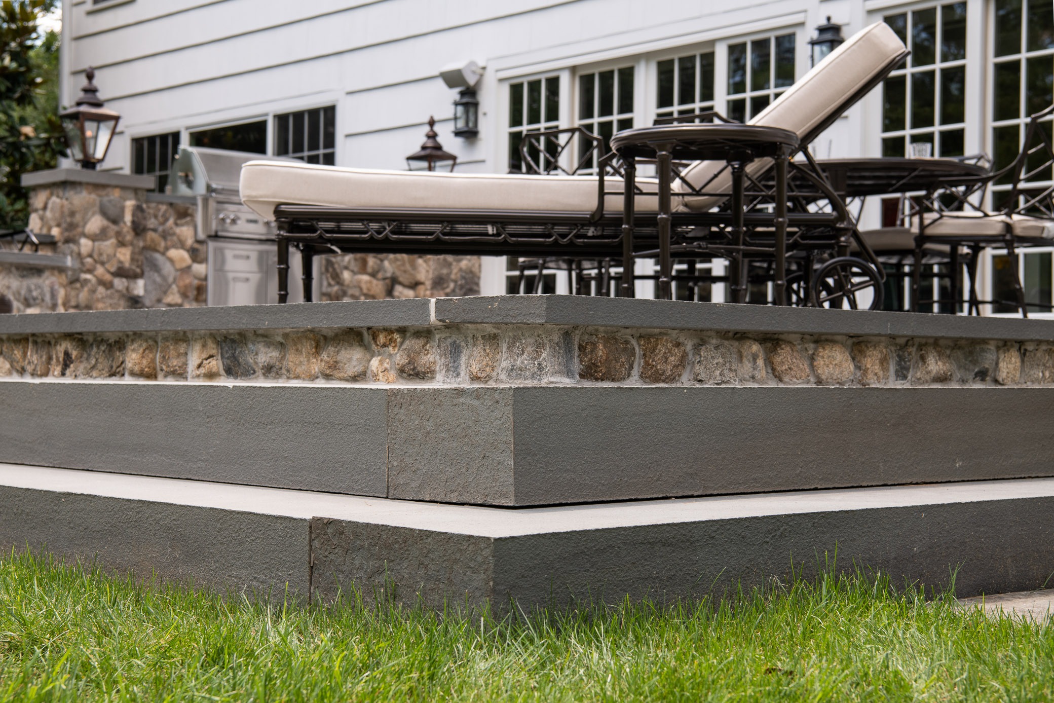 Elegant outdoor patio with stone steps.