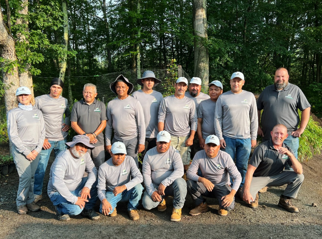 Group of landscapers posing outdoors
