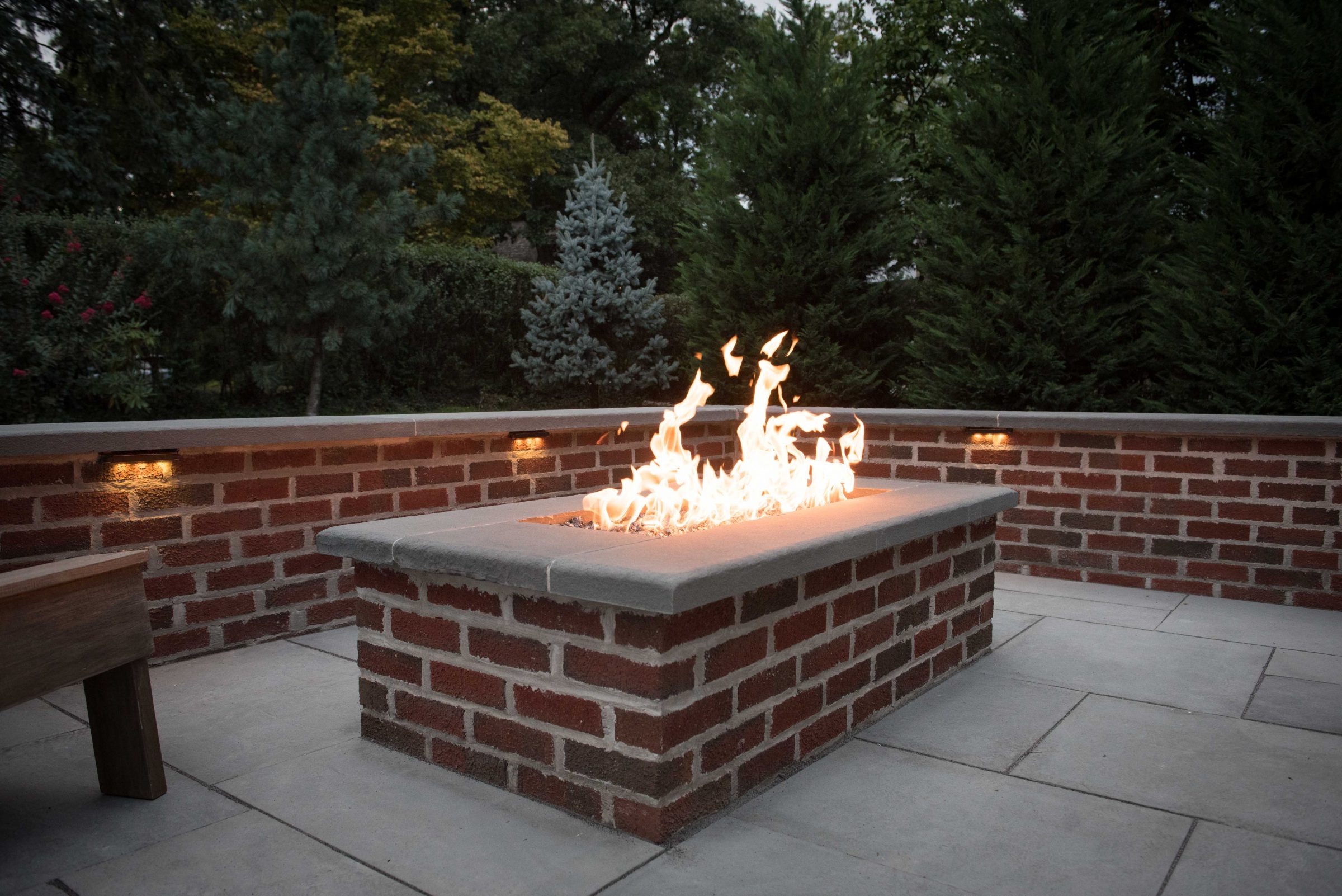 Brick fire pit with flames