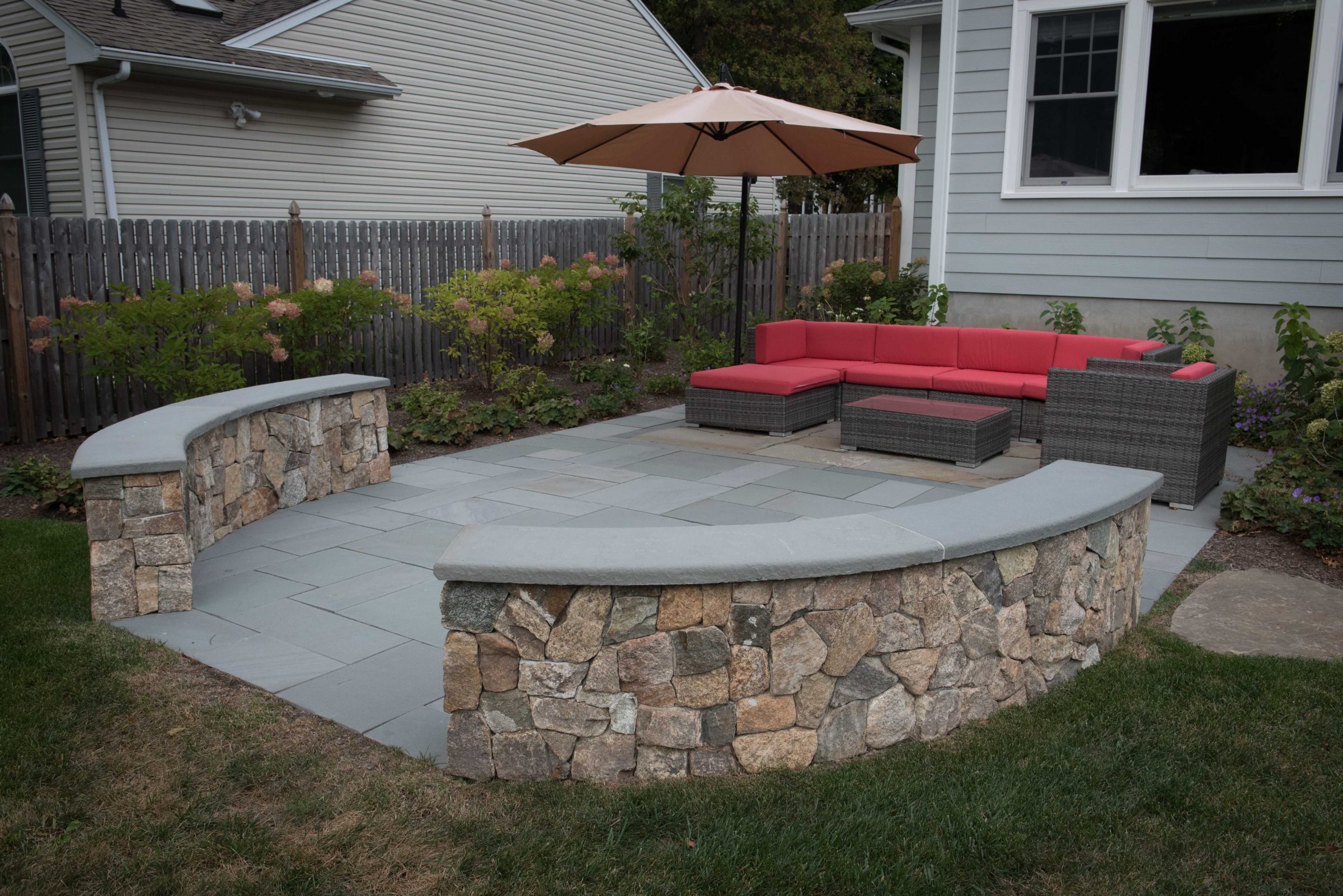 Stylish backyard patio with seating area.
