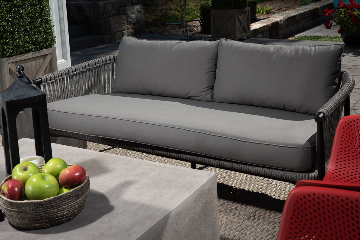 Outdoor patio with sofa and apples
