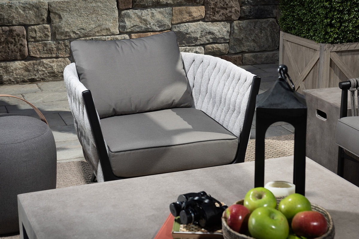 Cozy outdoor patio with seat and apples