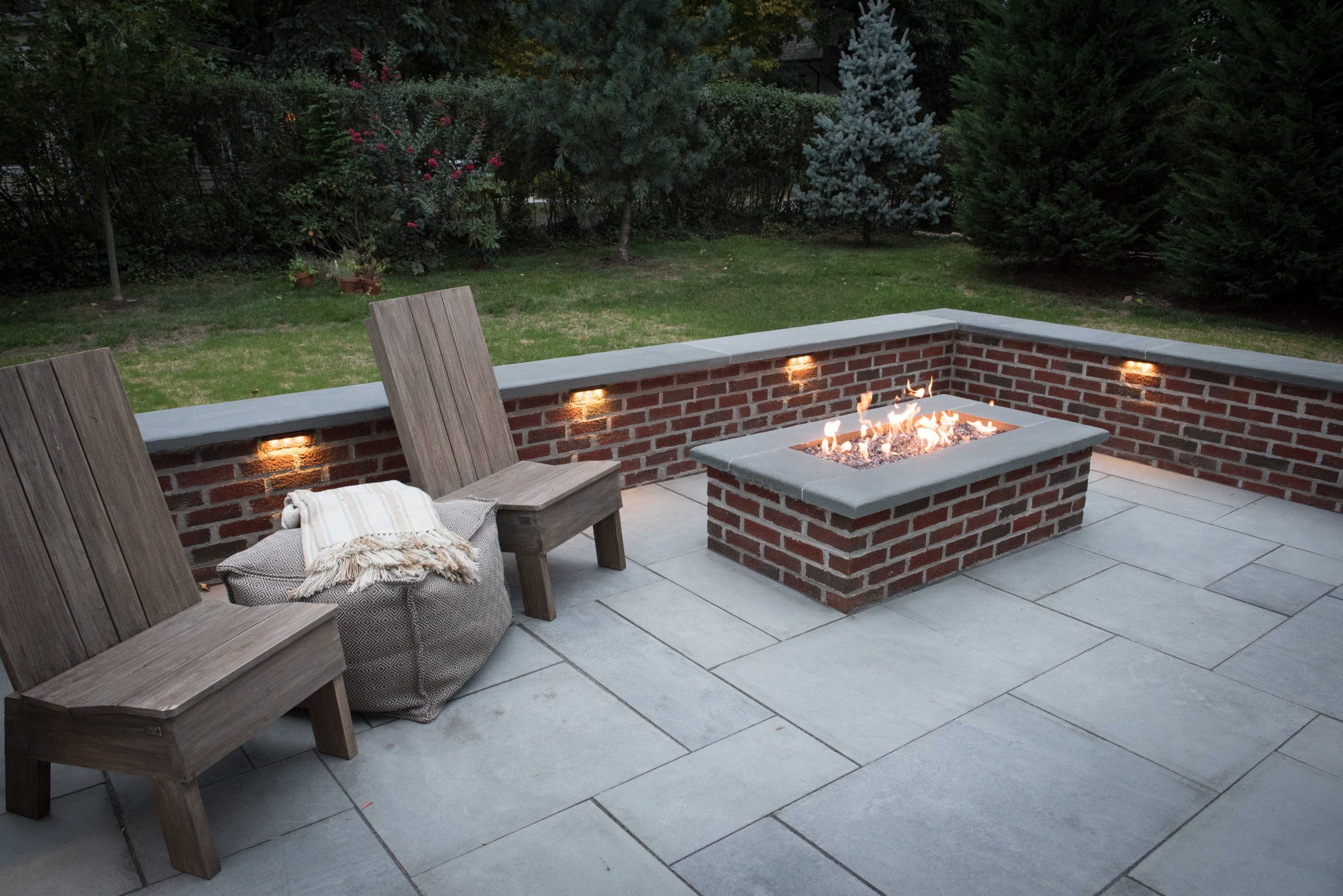 Cozy patio with fire pit and chairs