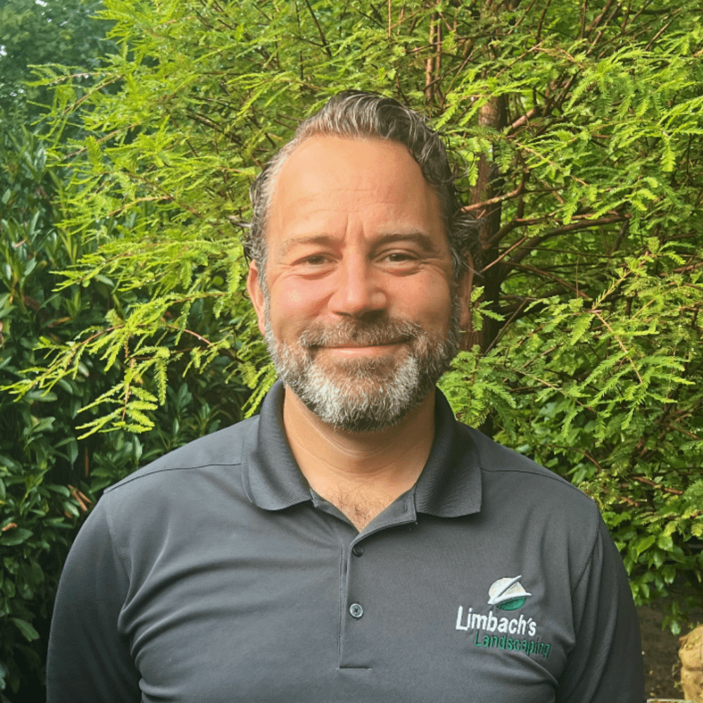 Man smiling in garden setting