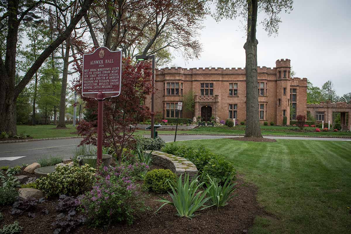Historic Alnwick Hall with garden view